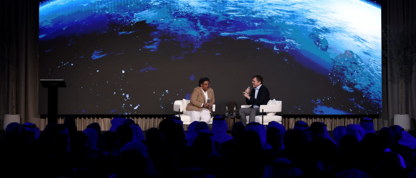 H.E. Mia Amor Mottley, Prime Minister of Barbados, in conversation with Nigel Topping, Former UN High Level Climate Champion, at the Abu Dhabi Sustainability Week Summit. 